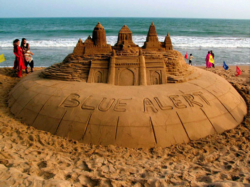 Internationally acclaimed sand sculptor, Sudarshan Patnaik, creates a  7 ft high sculpture of heritage monuments: the Jagannath temple and  Konark Sun Temple in Orissa, the Shore temple at Mammalapuram in  Tamilnadu, and the Gateway of India at Mumbai in the tidal zone of  Puri’s Golden Beach.