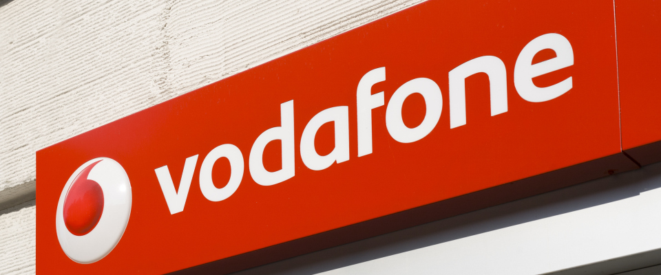 Ein Firmenschild von Vodafone.