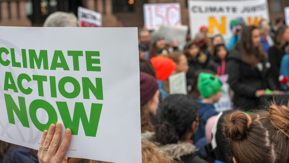 Protestler fordern ein Handeln gegen die Klimaerwärmung (Symbolbild).